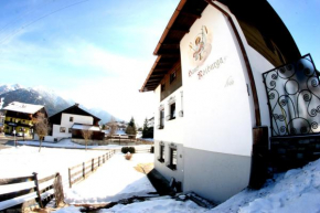 Гостиница Family Friendly Chalet - Central with Beautiful Mountain Views  Зеефельд